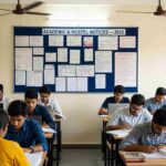 Students reading new hostel rules in small town Vishwavidyalaya 2025.